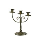 Goberg (Hugo Berger), Vienna, a wrought iron three-branch candelabra,