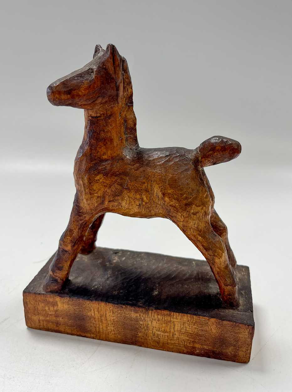 § Attributed to Arthur W. Simpson (1857-1922) of Kendal, a carved wood model of a foal, - Image 3 of 6