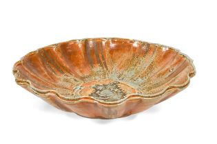 Attributed to Ruthanne Tudball (1948-), a large soda glazed studio pottery bowl,