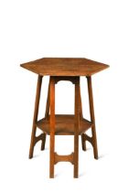 An Arts & Crafts oak two-tier occasional table,