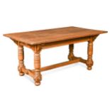 An oak architect designed library table,