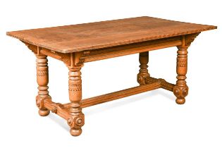 An oak architect designed library table,