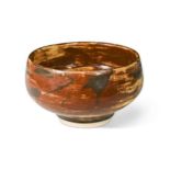 § Bernard Leach (1887-1979), an earthenware footed bowl, circa 1920s,