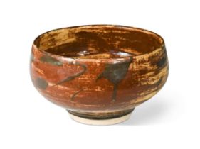 § Bernard Leach (1887-1979), an earthenware footed bowl, circa 1920s,