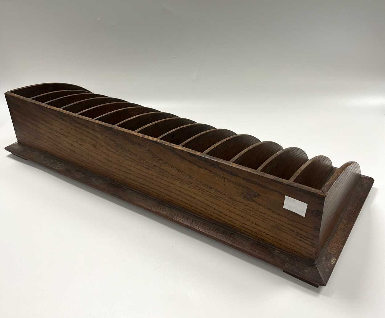 § Attributed to Arthur W. Simpson (1857-1922) of Kendal, an Arts & Crafts oak letter rack, - Image 3 of 6