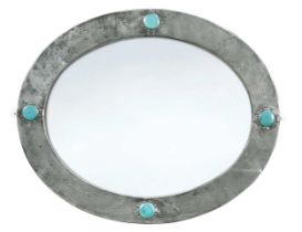 An Arts & Crafts pewter framed oval wall mirror,