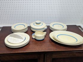 A Clarice Cliff Art Deco pattern part Dinner Service, of banded blue decoration, comprising eleven