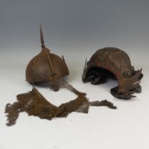 A 19th century Indo-Persian Khula Khud Helmet, with engraved scrolling flowers, plume holders,