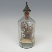 A rare early 19th century Napoleonic French prisoner of war Spinning Jenny in Bottle, the carved and