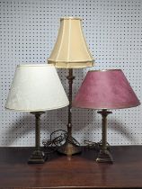 A pair of brass corinthian column table Lamps, H 30 cm, together with a larger gilt metal table