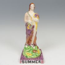 A 19thC lustre ware figure of Summer, possibly Dixon, Austin and Co, modelled with cornucopia nested
