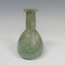 A Roman marbled glass toilet bottle c. 1st century AD, green with white striations and of pear shape