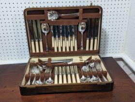 A mid-20thC Canteen of silver plated Cutlery, six place setting, the knives with bone handles,