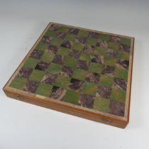 A contemporary carved stone Chess Set and Board, all pieces present, W 41 cm x D 41 cm.