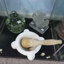 An antique green glass Dump, pontil mark to base, H 16 cm, together with a marble Pestle and