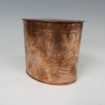 An Arts and Crafts Herbert Dyer copper oval Tea Caddy, hammered in relief with a fishing vessel at