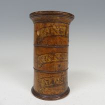 A 19th century treen three-tier spice Tower, the three tiers labelled 'Ginger', 'Cinnamon' and '