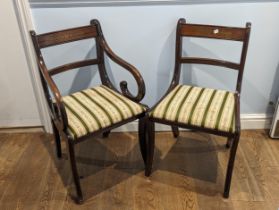 A set of twelve Regency style mahogany and brass inlay bar-back Dining Chairs, including two
