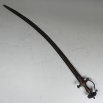 A 18th / 19th century Indian Tulwar Sword, with cruciform hilt and single edged curved blade, 90 cm.