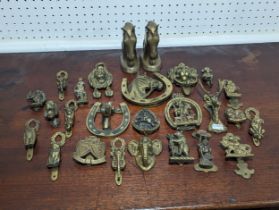 A quantity of antique brass door Knockers, inc ; John Peel, Dartmoor Pixie, an Elephant, a Dog, etc,