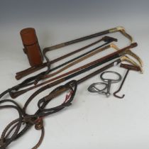 A silver mounted riding Crop by 'Whippy Saddler, London', together with another silver mounted