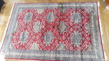 Tribal Rugs; a finely knotted red ground Persian rug, wool pile on cotton base, 280cm x 176cm,