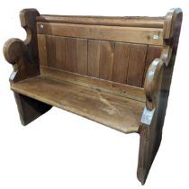 An early 20th century ecclesiastical style pitch-pine Pew, of small proportions, W 116 cm x H 91