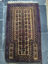 Tribal Rugs; an old Baluchi Prayer Rug, 100% wool, 128cm x 74cm, pile slightly worn.