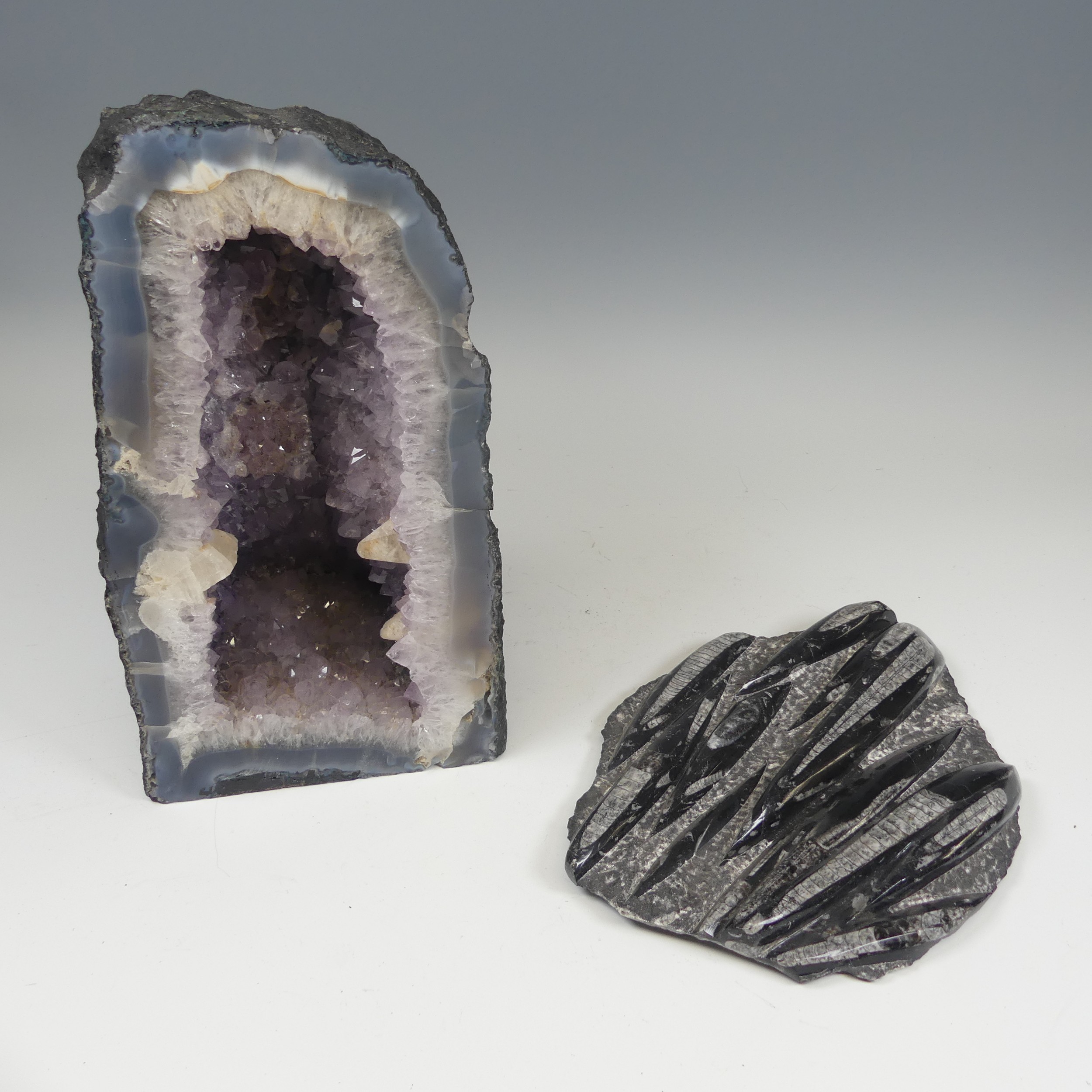 A large amethyst and quartz 'cathedral' Geode, free standing with flat base, with well-defined