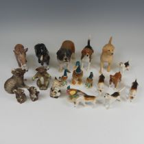 A family of Beswick pottery Koalas, comprising two larger and two smaller figures, in varying poses,