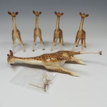A small herd of Beswick pottery Giraffes, to comprise one large model of a Giraffe, with three
