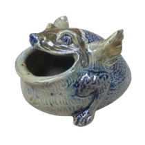 A fine Martin Brothers stoneware Spoon Warmer, dated 1879, in the grotesque form, the scaly creature