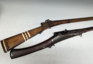 An Indian matchlock Toradar / Musket, with flared barrel, missing ramrod, L 175 cm, together with