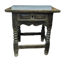 An antique probably 18th century side Table, overhanging top above single frieze drawer, raised on