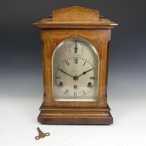 An Early 20th century Edwardian German Mantle Clock, marquetry case and silvered dial, the