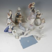 A quantity of Lladro Figures, to include a figure of a Potter, 'A Sunny Day', six others including