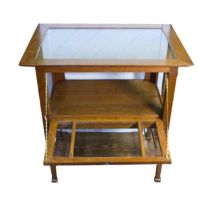 An oak four glass Vitrine / Bijouterie display Table, removable glass top above four bevelled