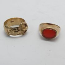 A 9ct yellow gold Buckle Ring, Size K, together with a small carnelian signet ring, mounted in 9ct