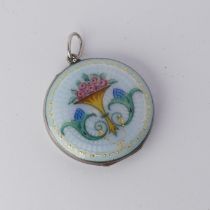 An enamelled circular Pendant Locket, the front with foliate decoration, the reverse with