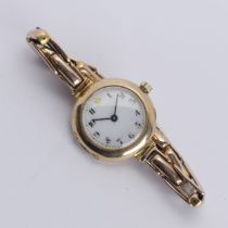 A 9ct gold lady's Wristwatch, white enamel dial with Arabic numerals, Aureole 17-jewels movement,