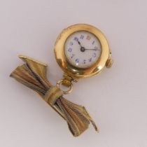 An 18ct yellow gold 'Nurse's' Fob Watch, unsigned white enamel dial with Arabic numerals, unsigned
