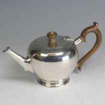 A George VI silver Teapot, by Blackmore & Fletcher Ltd., hallmarked London 1937, of bullet form with