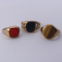 A 9ct yellow gold Signet Ring, the oval front set Tiger's Eye, Size J, together with a bloodstone