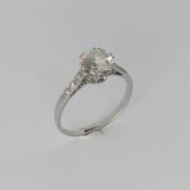 A diamond solitaire Ring, the circular stone approx. 1.3ct (7.3mm x 4.04mm) claw set with three
