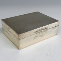 An Elizabeth II silver Cigarette Box, by A Wilcox., hallmarked Birmingham 1954, of hinged