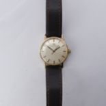 A 9ct gold Omega Automatic Wristwatch, silvered dial with gilt hands and baton markers, Cal. 552