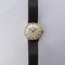 A 9ct gold Omega Automatic Wristwatch, silvered dial with gilt hands and baton markers, Cal. 552