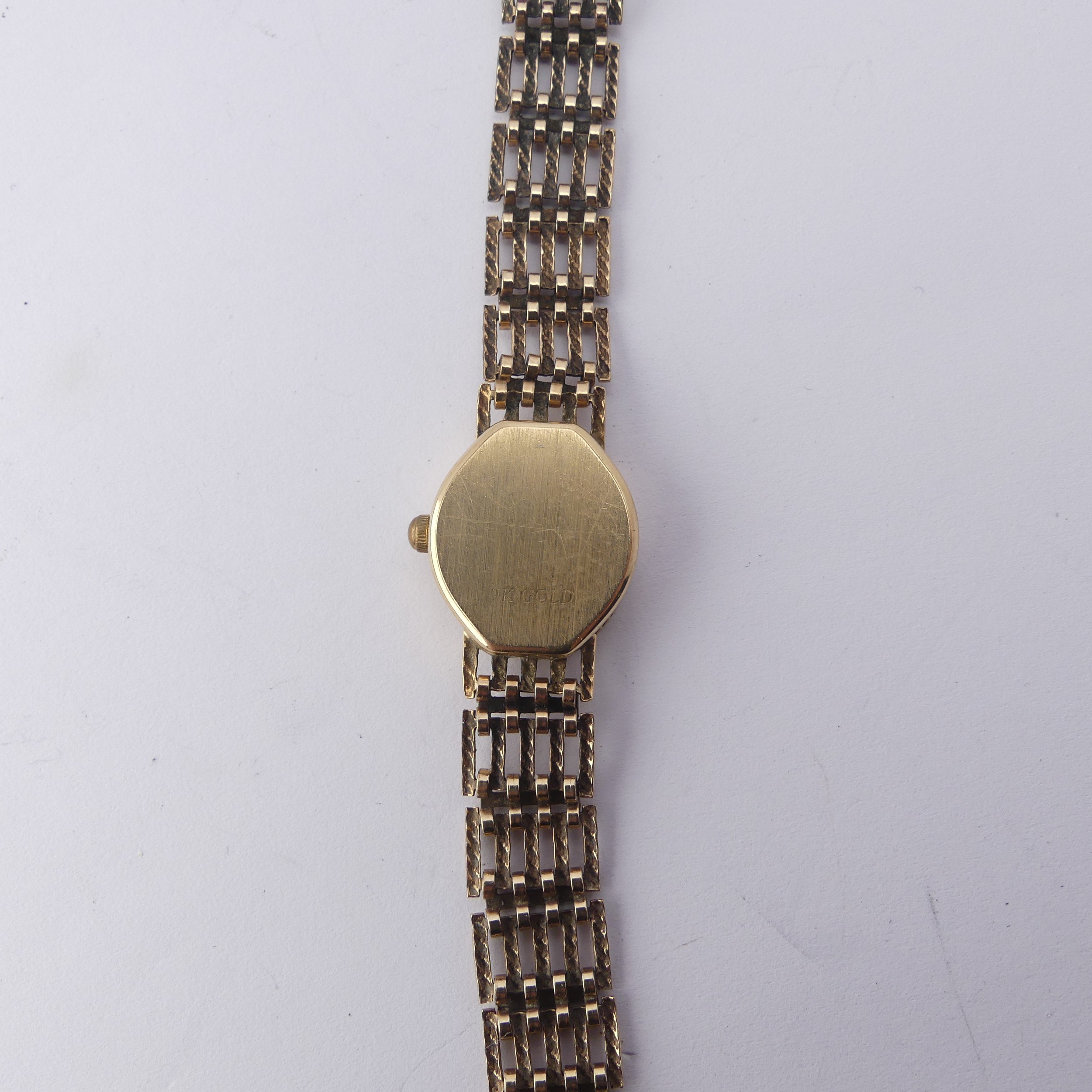 A 9ct gold lady's Rotary Wristwatch, with quartz movement, on a 9ct gold bracelet strap, gross total - Image 4 of 6
