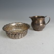 A Victorian circular silver Bowl, by George Unite & Sons, hallmarked London 1890, with wavy rim