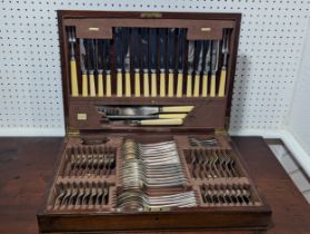 A Canteen of silver plated Cutlery, eight place setting, the knives with bone handles, in a fitted